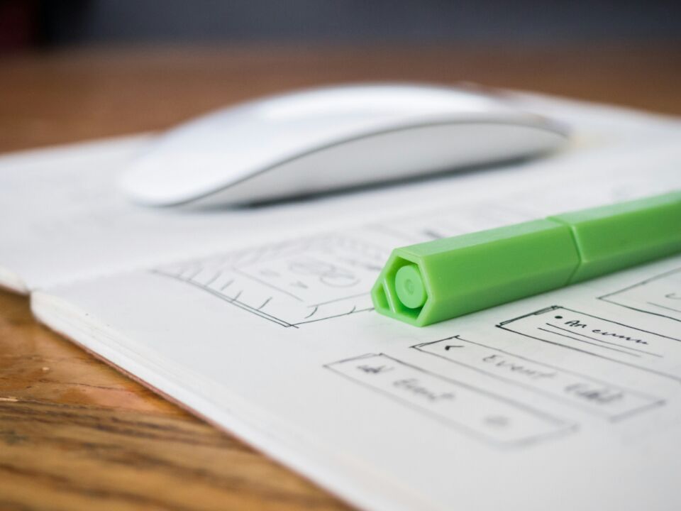 Colorful design tools and sketches on a desk